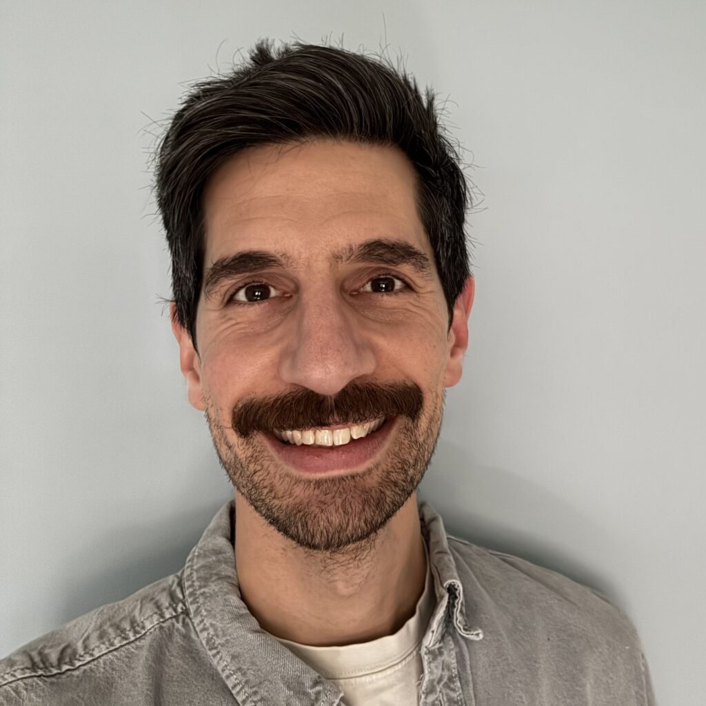 headshot of staff member Jamie Benzine